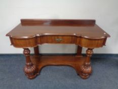 A Victorian mahogany Duchess style dressing table