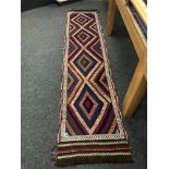 A Suzni kilim runner 313 x 68 cm.