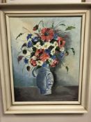 O. Rise : Still life with flowers in a vase, oil on canvas, 38 x 48 cm, framed.