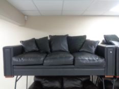 A pair of black leather three seater settee's with scatter back cushions.
