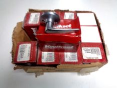 A box containing a quantity of Kwikset door handles.