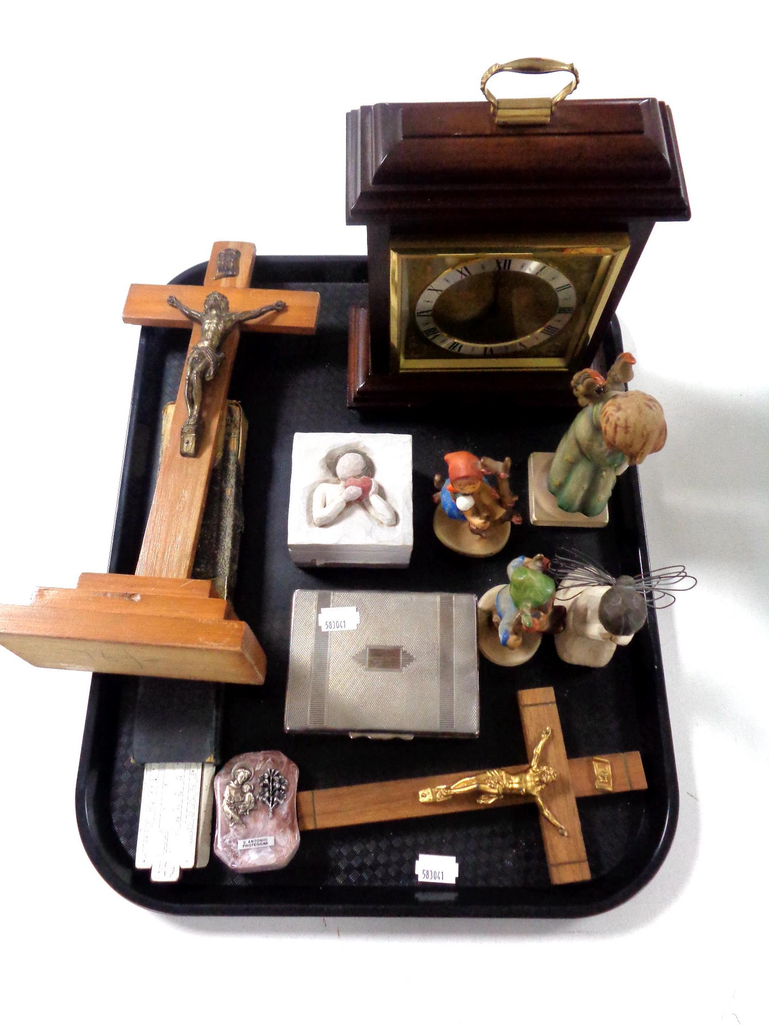 A tray of cased slide rule, Hummel figures, crucifixes,