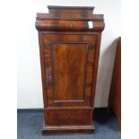 A late 19th century mahogany century door cabinet, fitted two drawers.