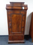 A late 19th century mahogany century door cabinet, fitted two drawers.