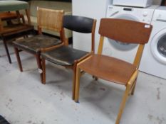 A mid 20th century teak bergere back dining chair together with a further mid 20th century teak