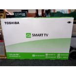 A boxed Toshiba 49U6763DB Smart TV (as new).