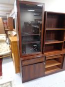 A mid 20th century Danish display cabinet, fitted cupboard and drawer beneath.