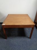 A mid 20th century Danish teak square coffee table.