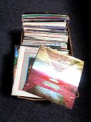 A box of vinyl LP's and 12" singles to include Supertramp, Moody Blues,