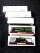 A tray of eleven die cast model trains in original packaging