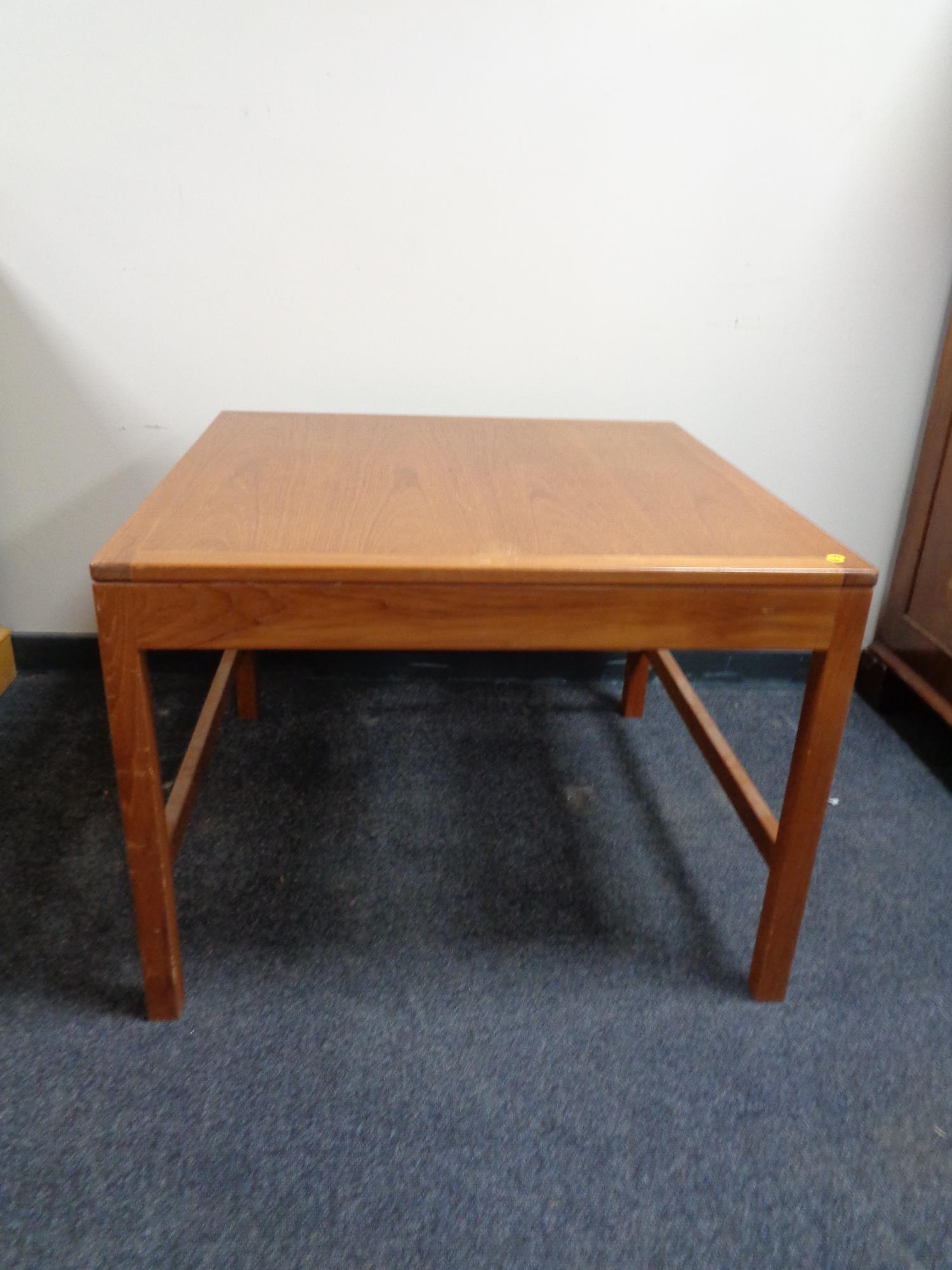 A mid 20th century Danish teak square coffee table.