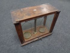 A set of antique chemist's scales in case.