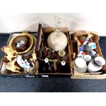 Three boxes containing miscellany to include table lamps with shades, antique pottery mixing bowls,