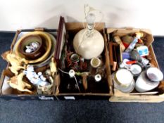 Three boxes containing miscellany to include table lamps with shades, antique pottery mixing bowls,