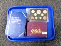 A collection of coin folders and albums including Coins of Great Britain 1970, Shilling collection,