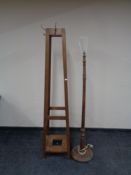 A beech standard lamp together with an early 20th century hat and coat stand
