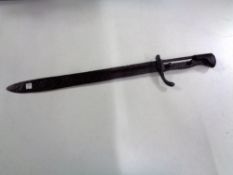 A World War II German bayonet (in rusted condition)