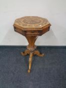A Victorian inlaid rosewood pedestal work table