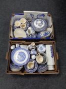 Two boxes containing a large quantity of 20th century Staffordshire blue and white willow pattern
