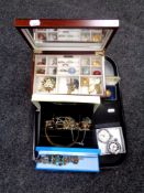 A tray containing silver and costume jewellery, fob watches etc.