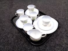 A tray containing 14 pieces of Susie Cooper bone tea china.