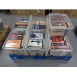 A pallet containing approximately 7 boxes of books