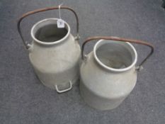 A pair of aluminium swing handled milk churns