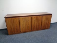 A Skovby high gloss teak four door sideboard