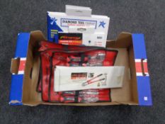 A box containing new tools including Neilsen 14 inch bolt cutter, three 7 piece wood chisel sets,