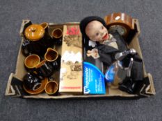 A box containing ventriloquist's doll, soda siphon, glazed pottery tea set, mantel clock etc.