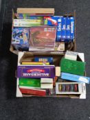 Two boxes containing a large quantity of modern games and puzzles, die cast cars etc.