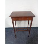 A mahogany single drawer occasional table