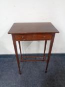 A mahogany single drawer occasional table