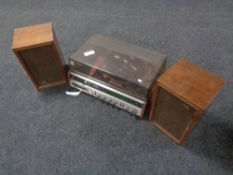 A Sony stereo music system HP-239A solid state in teak case together with a pair of Sony speakers.