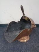 A Victorian copper coal receiver with shovel