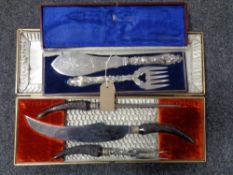 A Victorian silver plated two part fish server in case together with a further horn handled carving