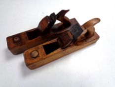 Two vintage woodworking planes, one marked Hearnshaw Bros, the other Aaron Hildick.