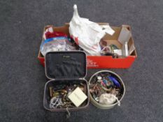 A box containing a large quantity of costume jewellery.