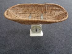 A Hughes family scale with basket.