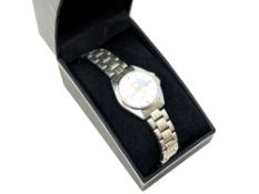 A lady's stainless steel Sekonda quartz calendar wristwatch, boxed.