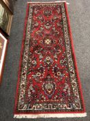 A Persian Saroukh rug 80 x 203 cm