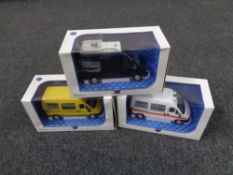 Three boxed Fiat die cast vans.