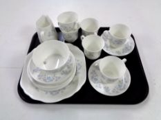 A tray containing 21 pieces of Royal Tuscan fine bone tea china.