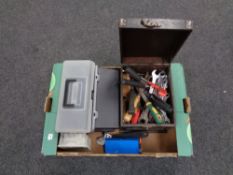 A box of toolboxes containing various hand tools.