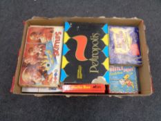 A box containing a large quantity of 20th century games including Skittles, Noughts and Crosses,