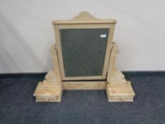 A carved pine dressing table mirror back