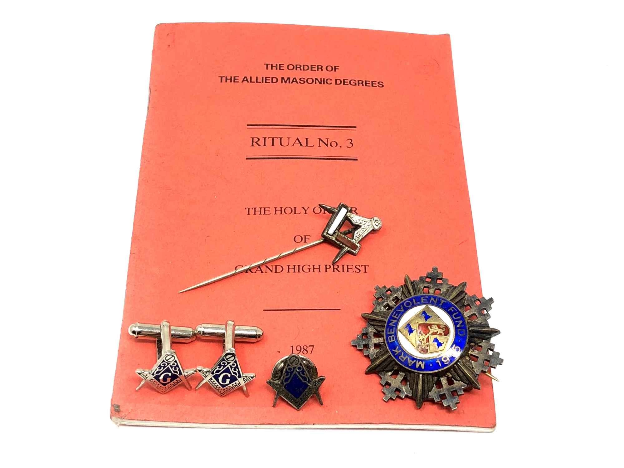 A silver Masonic medal, agate pin,