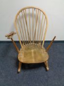 An Ercol elm spindle back rocking chair (as found)