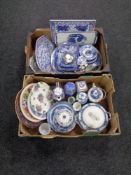 Two boxes containing a large quantity of blue and white porcelain meat plates,