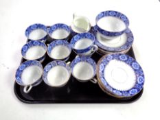 A tray containing 31 pieces of Richmond blue and gilt tea china.